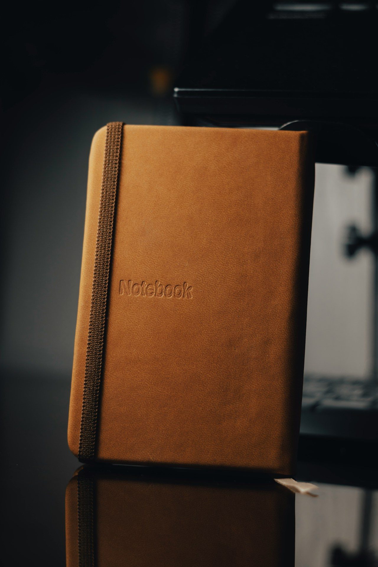 brown book on white table